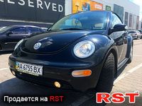 VOLKSWAGEN New Beetle